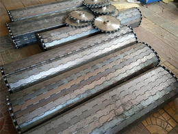 绵阳输送带-金属冲孔链板输送带-不锈钢传动网带厂家