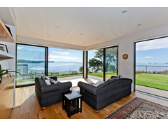 Unabated-sea-views-from-the-living-area-of-the-stylish-Auckland-home.jpg